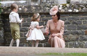 Duchess of Cambridge (in Alexander McQueen), Prince George and Princess Charlotte (Pepa & Co.) at the wedding of James Matthews and Pippa Middleton