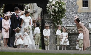 Pippa Middleton wedding The Duchess of Cambridge (in Alexander McQueen), Prince George, Pippa Middleton and James Matthews