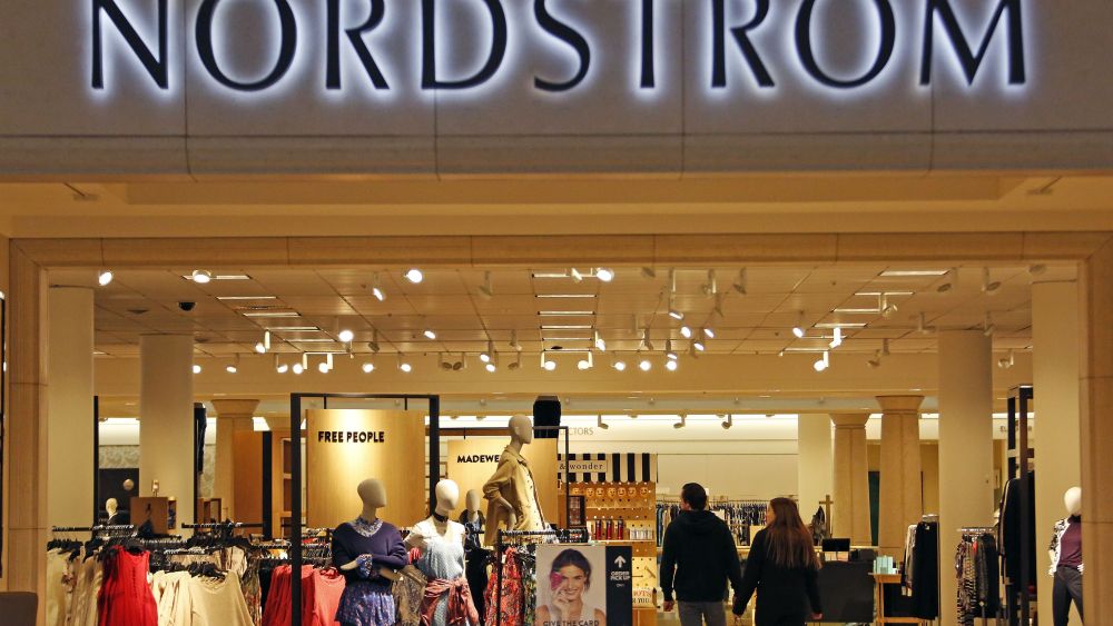Shoppers walk into a Nordstrom store in Pittsburgh.