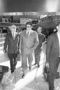 Pierre Bergé and designer Yves Saint Laurent arriving in New York for the launch of Champagne perfume.