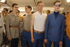 Models backstage at Louis Vuitton's spring 2015 menswear show.