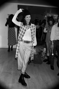 Christy Turlington, mad for plaid, backstage at Marc JacobsÕ Perry Ellis Spring 1993 runwayÊ