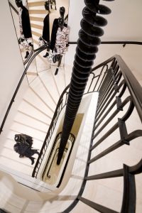A sculpture by Gregor Hildebrandt in the staircase of Chanel's new Paris flagship.