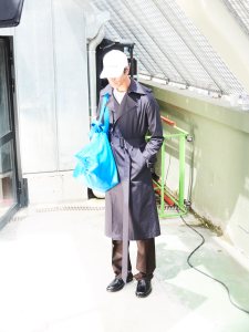 A model holds a leather bag resembling Ikea's iconic shopper.