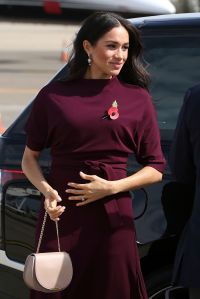 Meghan, the Duchess of Sussex, arrives farewelled at the airport following the Invictus Games in Sydney, . Prince Harry and Meghan are traveling to New Zealand to continue their tour of the South PacificBritain Royals, Sydney, Australia - 28 Oct 2018Wearing Hugo Boss, Bag By Cuyana