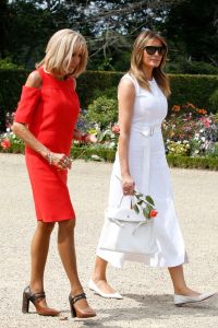MAXPPP OUT Mandatory Credit: Photo by REGIS DUVIGNAU/POOL/EPA-EFE/Shutterstock (10371530ba) Brigitte Macron (L), wife of French President Emmanuel Macron, and U.S. First Lady Melania Trump (R) walk in the garden of the Villa Arnaga, House-museum of Edmond Rostand during a tour on a traditional Basque culture as part of the G7 summit, in Espelette, near Biarritz, France, 25 August 2019. The G7 Summit runs from 24 to 26 August in Biarritz. G7 Summit Biarritz in France, Espelette - 25 Aug 2019