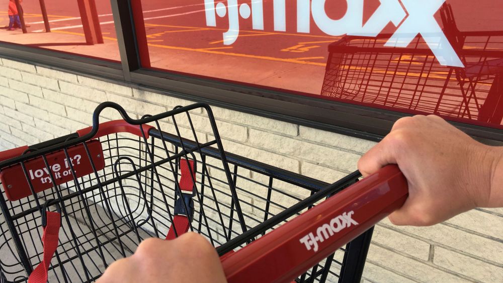 A shopper pushes a cart to a T.J. Maxx store entrance, in North Andover, Mass. The TJX Cos. Inc., parent of T.J. Maxx, Marshalls and other stores, reports financial results Tuesday, Aug. 15, 2017Earns TJX Cos, North Andover, USA - 16 May 2017