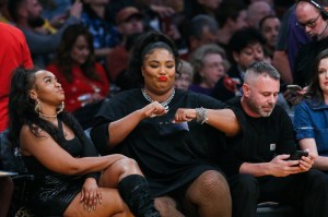 Singer Lizzo attends an NBA basketball game between Los Angeles Lakers and Minnesota Timberwolves, Sunday, Dec. 8, 2019, in Los Angeles. The Lakers won 142-125. (AP Photo/Ringo H.W. Chiu)