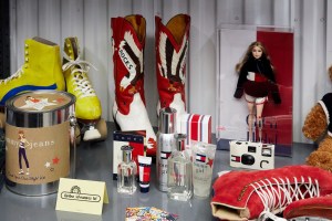 Various Tommy Hilfiger collectibles including the cowboy boots worn by Naomi Campbell on the runway.