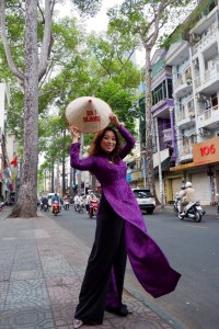 Le y Lan in a local tailor in Saigon/Ho Chi Minh City, Vietnam. The outfit is a traditional Vietnamese dress.