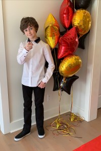 Luke Roessler in Emporio Armani Kids.
