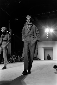 A model poses on the runway in a look from the Issey Miyake Fall 1977 menswear collection.