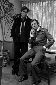 Designer Guy Laroche poses with a model in a look from his fall 1976 menswear collection in New York City on February 12, 1976.