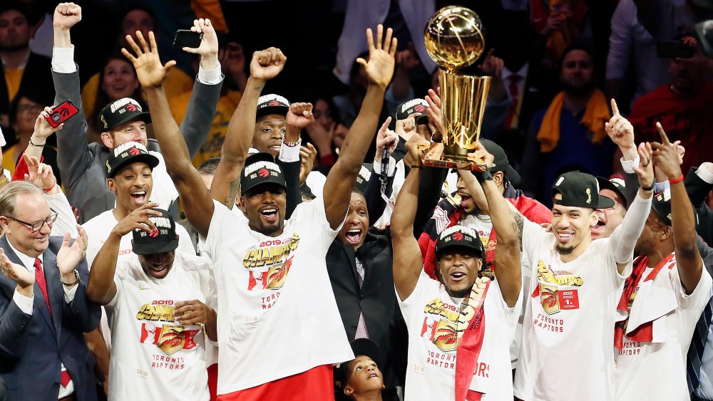 OAKLAND, CA - JUNE 13: Kyle Lowry #7 of the Toronto Raptors celebrates with the Larry O'Brien Trophy after winning Game Six of the NBA Finals on June 13, 2019 at ORACLE Arena in Oakland, California. NOTE TO USER: User expressly acknowledges and agrees that, by downloading and/or using this photograph, user is consenting to the terms and conditions of Getty Images License Agreement. Mandatory Copyright Notice: Copyright 2019 NBAE (Photo by Chris Elise/NBAE via Getty Images)