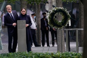 Meghan Markle and Prince Harry pause while getting a tour of the National September 11 Memorial & Museum in New York, Thursday, Sept. 23, 2021. The Duke and Duchess of Sussex got a hawk's-eye view of New York City with a visit to the rebuilt World Trade Center's signature tower. (AP Photo/Seth Wenig)