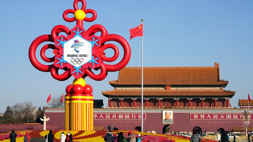 A huge monument promoting the Beijing Winter Olympics is seen in Tiananmen Square in the Chinese capital on Jan. 27, 2022, ahead of the Olympics opening on Feb. 4. (Kyodo via AP Images) ==Kyodo