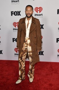 John Legend arrives at the iHeartRadio Music Awards on Tuesday, March 22, 2022, at the Shrine Auditorium in Los Angeles. (Photo by Jordan Strauss/Invision/AP)