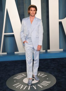 Chase Stokes at the Vanity Fair Oscar Party held at the Wallis Annenberg Center for the Performing Arts on March 27th, 2022 in Beverly Hills, California.