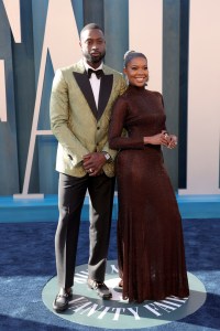 Dwyane Wade and Gabrielle Union at the Vanity Fair Oscar Party held at the Wallis Annenberg Center for the Performing Arts on March 27th, 2022 in Beverly Hills, California.