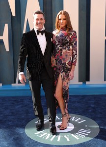 Jon Hamm and Anna Osceola at the Vanity Fair Oscar Party held at the Wallis Annenberg Center for the Performing Arts on March 27th, 2022 in Beverly Hills, California.