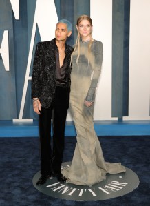 Dominic Fike and Hunter Schafer at the Vanity Fair Oscar Party held at the Wallis Annenberg Center for the Performing Arts on March 27th, 2022 in Beverly Hills, California.