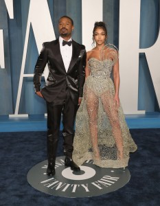 Michael B. Jordan and Lori Harvey at the Vanity Fair Oscar Party held at the Wallis Annenberg Center for the Performing Arts on March 27th, 2022 in Beverly Hills, California.