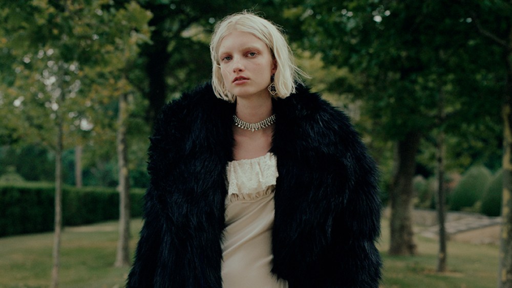 Saint Laurent's faux fur coat and silk dress. Jennifer Behr crystal necklace; Joomi Lim crystal earring