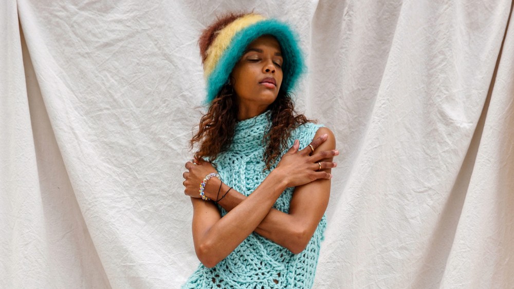 Christian Wijnants’ hand-knitted wool silk cashmere blend knit dress. Nong Rak hat. Labucq sandals. Lafayette 148 socks. Panconesi ear cuff. String Ting and Roxanne Assouline bracelets.