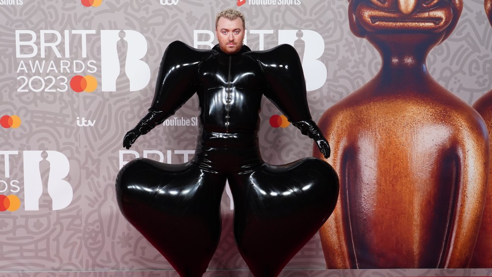 Sam Smith attends The BRIT Awards 2023 outfit at The O2 Arena on February 11, 2023, in London, England, wearing a bespoke Harri look.