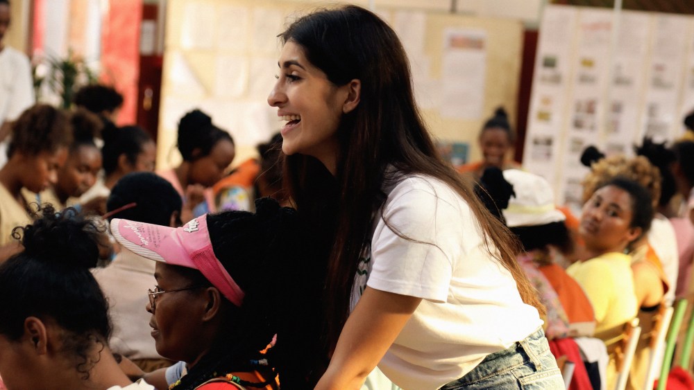Eileen Akbaraly, founder, designer and chief executive officer of Made For A Woman, leaning against the back of a chair in her Madagascar factory.