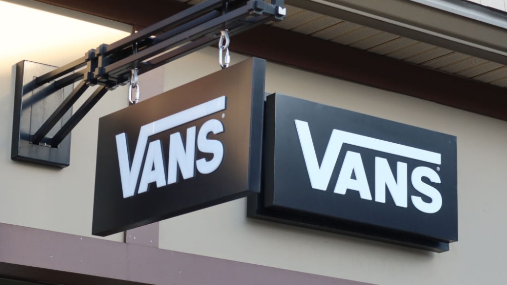 A Vans sign hangs in front of its store at the Woodbury Common Premium Outlets shopping mall on Nov. 24, 2020 in Central Valley, N.Y.