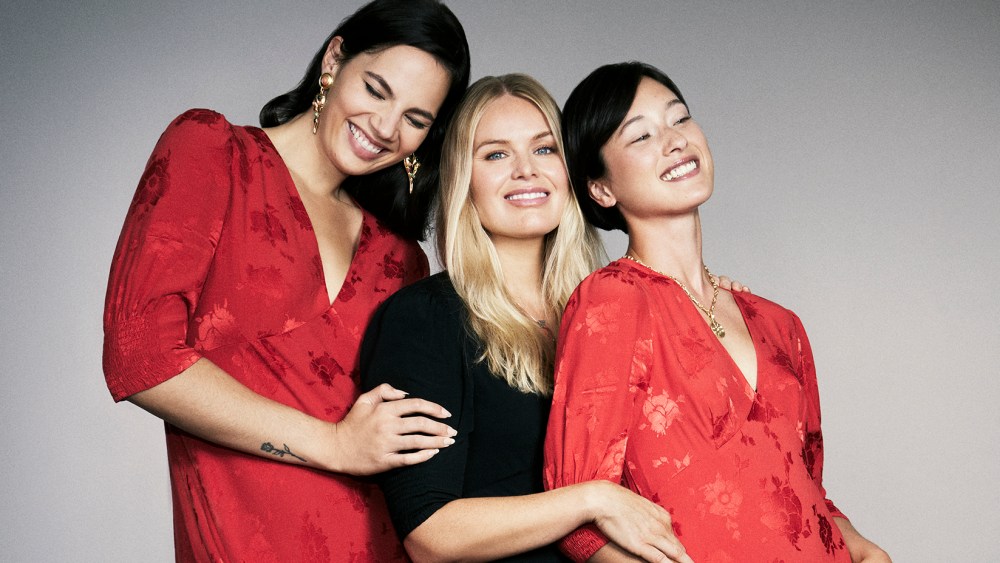Rixo co-founder Orlagh McCloskey with models wearing the dress that's part of the Smart Works capsule collection.