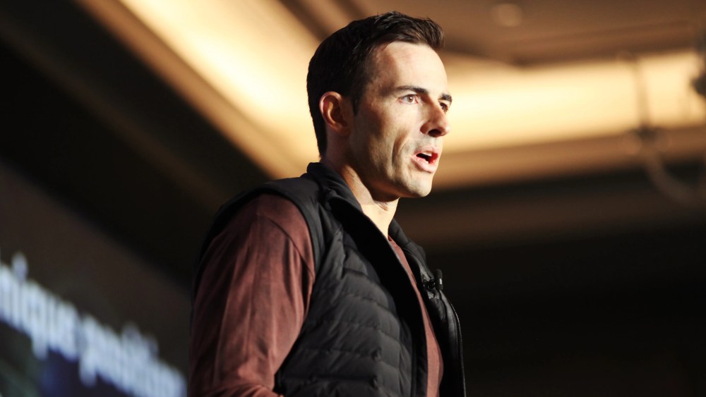 Calvin McDonald in vest on stage