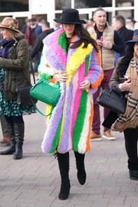A racegoer wearing a colourful coat on day three of the 2024 Cheltenham Festival at Cheltenham Racecourse. Picture date: Thursday March 14, 2024. (Photo by Adam Davy/PA Images via Getty Images)