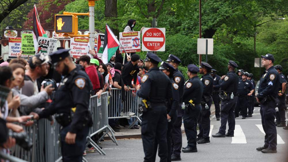 Police face pro-Palestinian demonstrators near the Met Gala at the Metropolitan Museum of Art on May 6, 2024 in New York. (Photo by CHARLY TRIBALLEAU / AFP) (Photo by CHARLY TRIBALLEAU/AFP via Getty Images)