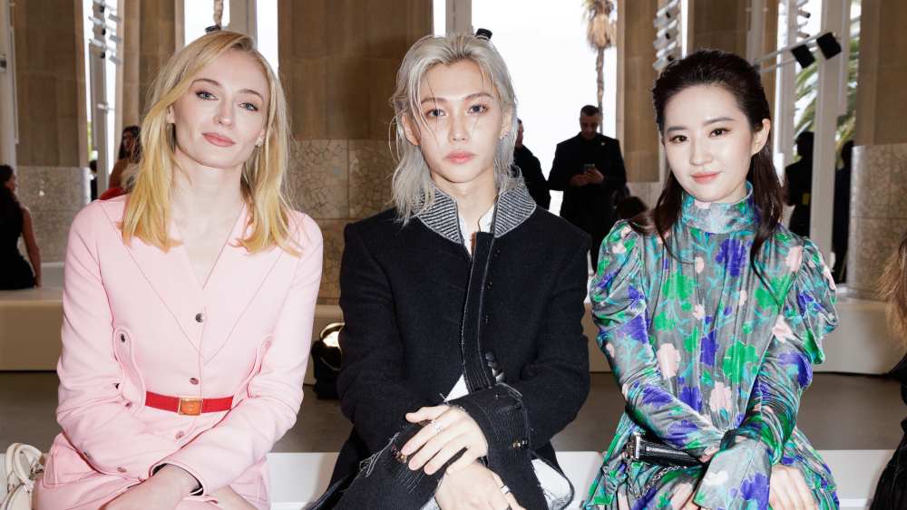 Sophie Turner, Felix and Liu Yifei front row at the Louis Vuitton Cruise 2025 show.