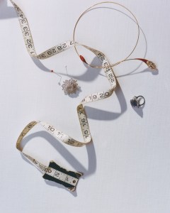 Taffin light brown "Moval" diamond, zircon red ceramic and 18-karat rose gold necklace. Chanel High Jewelry in white gold, yellow diamonds, and diamonds. Graff emerald-cut sapphire set on a Promise ring with White Heart Diamond Shoulders.