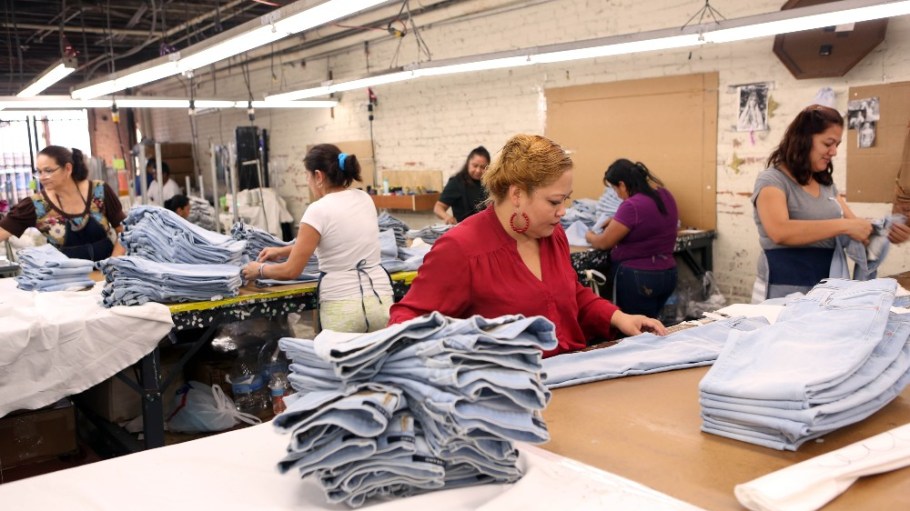 Jeans are inspected in a quality control room at the J Brand offices and factory downtown Los Angeles.