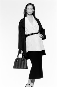 Model holding the Fendi spring 1993 “Pequin” stripe satchel.