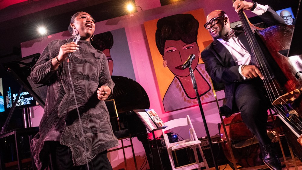 Samara Joy and Christian McBride performing at the Jazz House Kids benefit at the Ralph Pucci gallery.