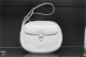 Fendi 1974 embossed “FF” leather saddle bag.