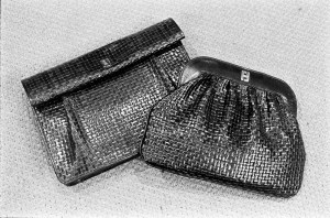 Fendi 1975 leather basketweave clutches with raised FF insignia.