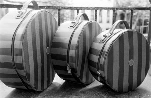 Fendi’s 1989 signature pequin striped black and brown travel luggage.