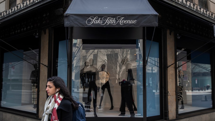 NEW YORK, NY - MARCH 18: Pedestrians pass by Saks Fifth Avenue Department store as it sits closed in the wake of the Coronavirus, COVID19, outbreak on March 18, 2020 in New York City. Businesses continued to close days after bars and restaurants shuttered as authorities in New York weighed a "shelter-in-place" order for the entire city. (Photo by Victor J. Blue/Getty Images)