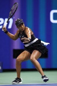 NEW YORK, NEW YORK - AUGUST 29: Naomi Osaka of Japan returns a shot against Karolina Muchova of Czech Republic during their Women's Singles Second Round match on Day Four of the 2024 US Open at USTA Billie Jean King National Tennis Center on August 29, 2024 in the Flushing neighborhood of the Queens borough of New York City. (Photo by Luke Hales/Getty Images)