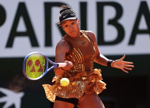 PARIS, FRANCE - MAY 26: Naomi Osaka of Japan plays a forehand against Laura Siegemund of Germany during the Women's Singles first round match during Day Three of the 2026 French Open at Roland Garros on May 26, 2026 in Paris, France. (Photo by Dan Istitene/Getty Images)