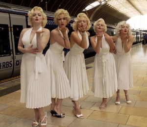 LONDON - JUNE 23:  Five Marilyn Monroe look-alikes participate in the Heathrow Express Fifth birthday celebrations at Paddington Station on June 23, 2003 in London. (Photo By Steve Finn/Getty Images)